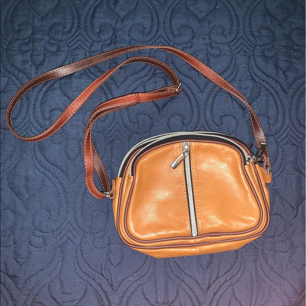 Genuine leather cross body bag with 3 pockets